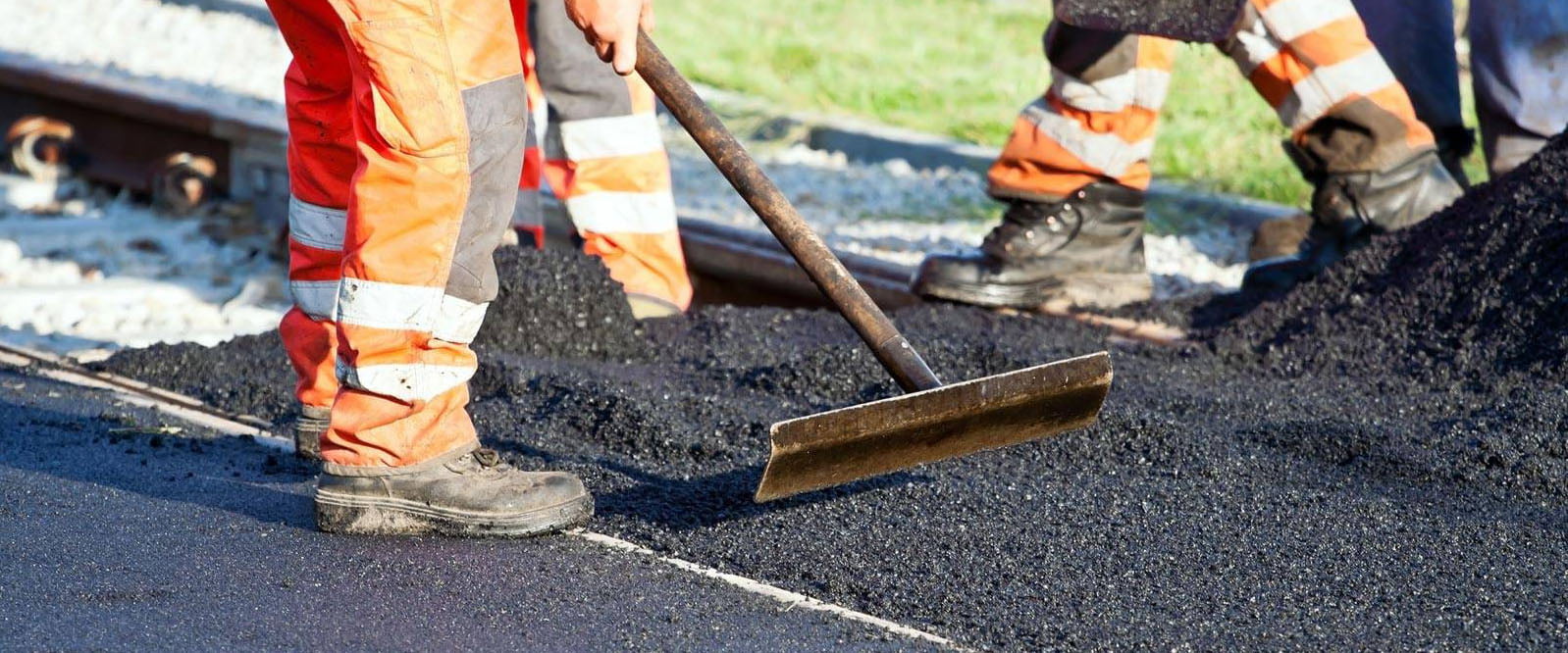 Commercial road paving with asphalt paving machine in Toronto